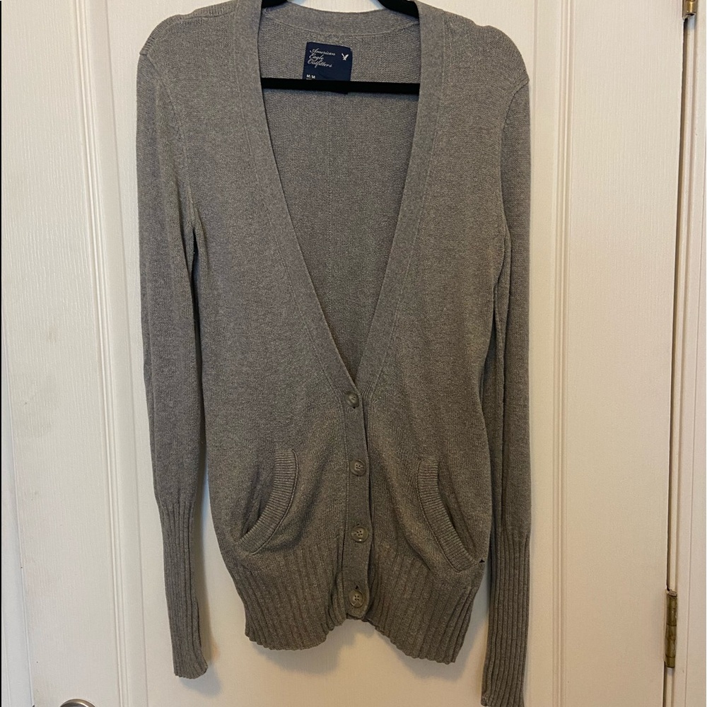 Long button up cardigan. Long sleeves for folding/scrunching. 29” neck to bottom